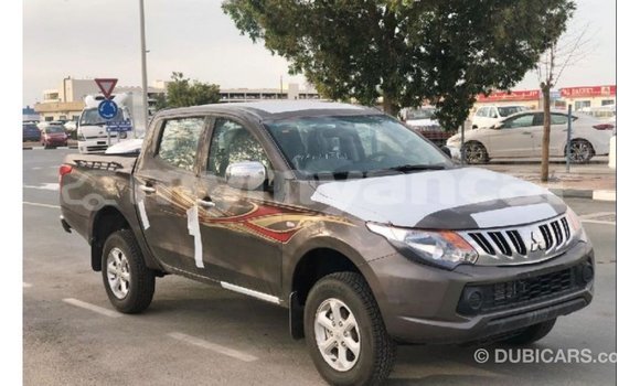 သွင်းကုန် Mitsubishi L200 Brown ကား Import - Dubai Ayeyarwady သွင်းကုန် Mitsubishi L200 Brown ကား Import - Dubai Ayeyarwady