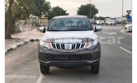 သွင်းကုန် Mitsubishi L200 Brown ကား Import - Dubai Ayeyarwady သွင်းကုန် Mitsubishi L200 Brown ကား Import - Dubai Ayeyarwady