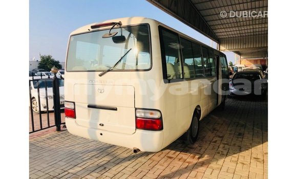 သွင်းကုန် Toyota Coaster White ကား Import - Dubai Ayeyarwady သွင်းကုန် Toyota Coaster White ကား Import - Dubai Ayeyarwady