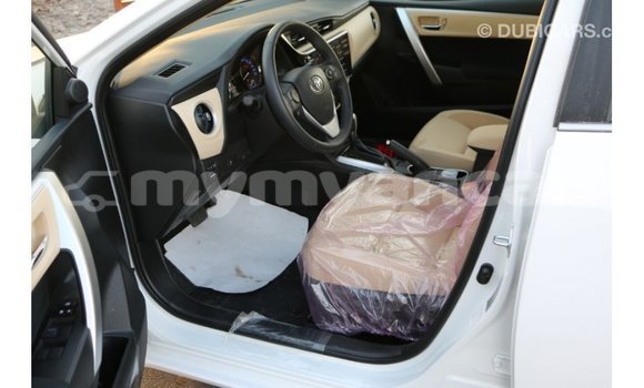Buy Import Toyota Corolla White Car in Import - Dubai in Ayeyarwady Buy Import Toyota Corolla White Car in Import - Dubai in Ayeyarwady